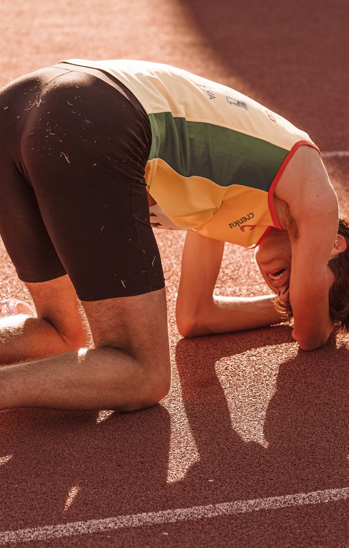 Runner spent on the track after a hard effort